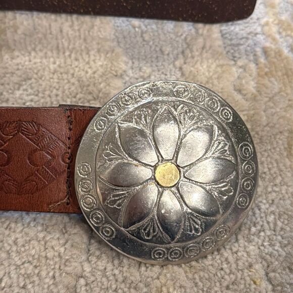Vintage Linea Pelle studded leather belt with floral two toned metal buckle